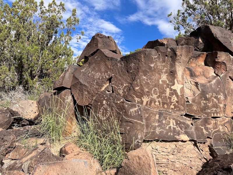 Ancient Rock Art Across A Quiet Mesa