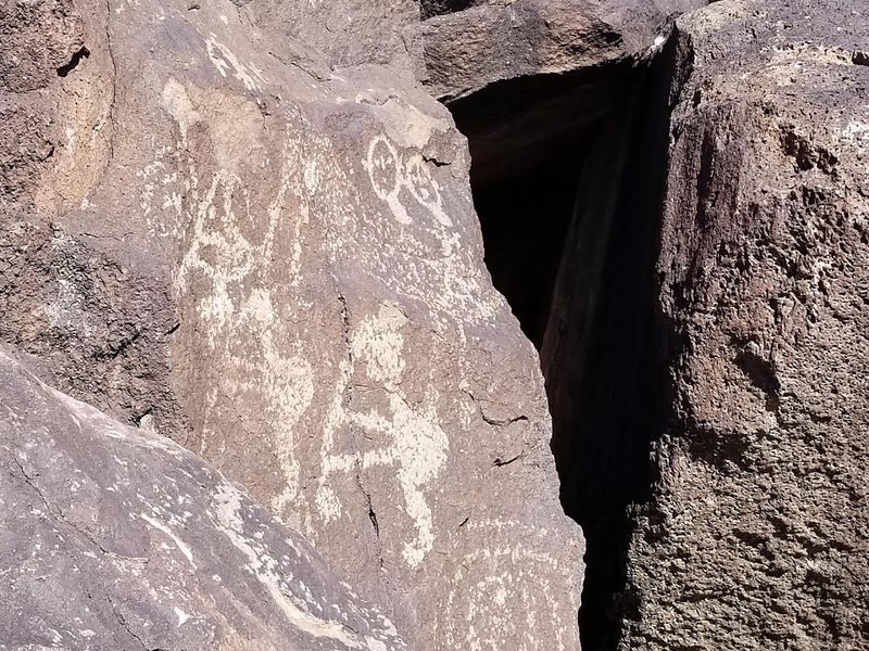 Ancient Marks Across Volcanic Stone