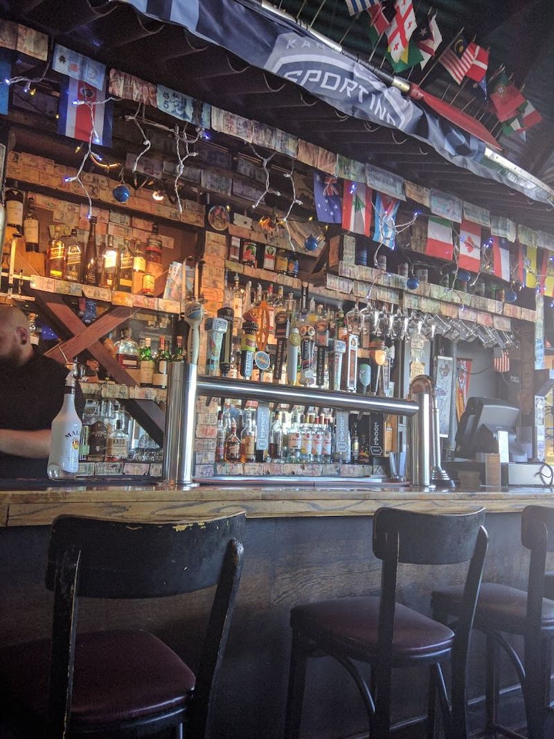 The Atmosphere: Currency, Flags, and a Ceiling That Tells a Story