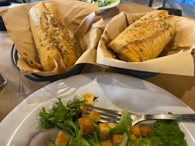 Garlic Loaf, Potatoes, Corn, And Butter