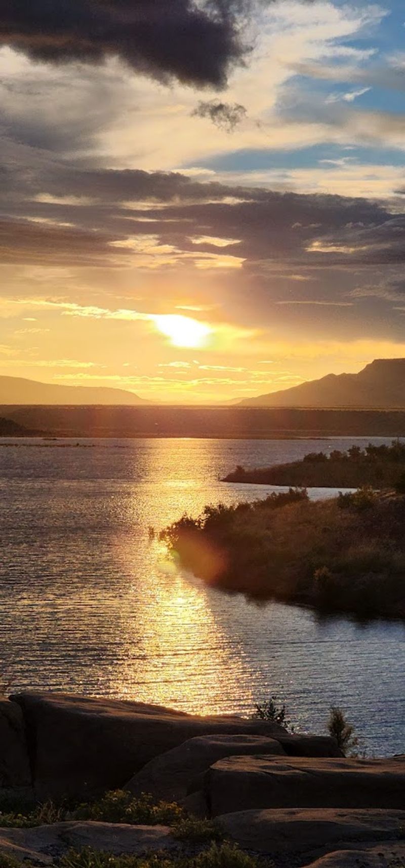 Sunlit Ridges Framing The Lake
