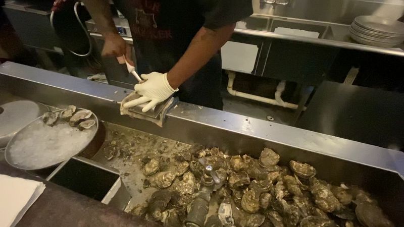 Observe The Oyster Shuckers' Art