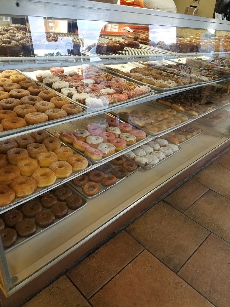 Fresh Donuts Fill The Display Case Daily