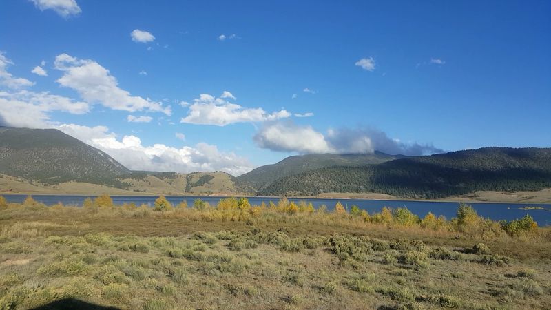 Golden Grasslands Stretching Toward The Peaks