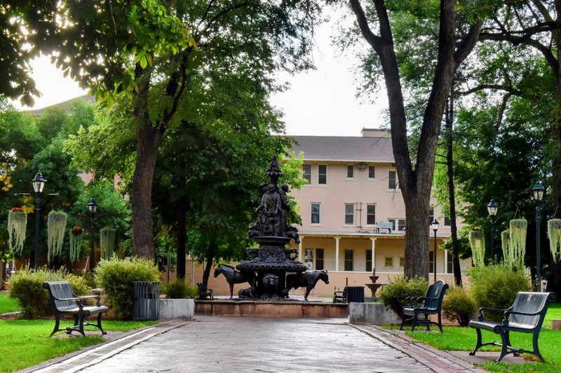 A Peaceful Green Space Hides Beside The Plaza