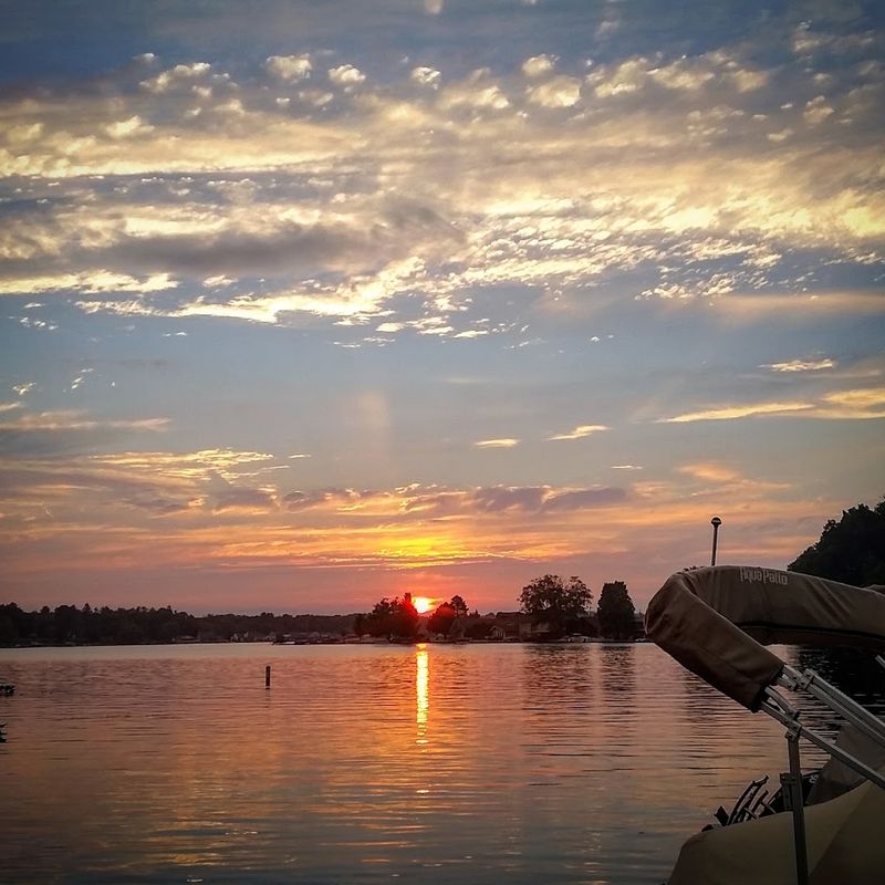 Sunset Turns The Lake Into A Painted Horizon