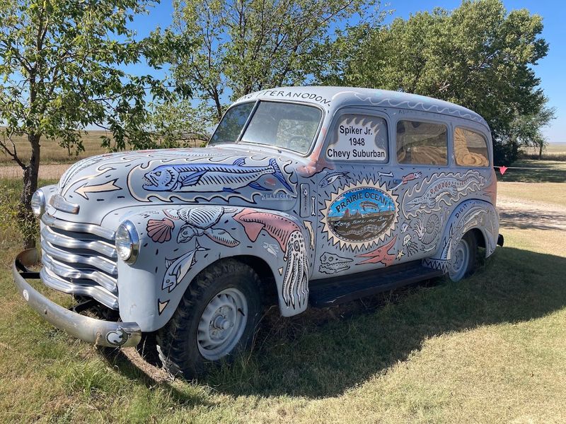 The Painted 1948 Suburban Parked Outside