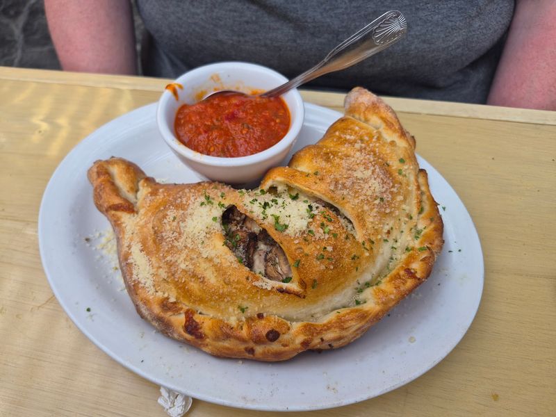 Enormous Calzones Turn Dinner Into A Group Project