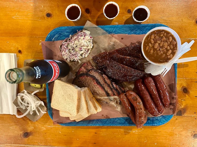 Ribs, Sausage, Turkey, And The Plates Worth Saving Room For