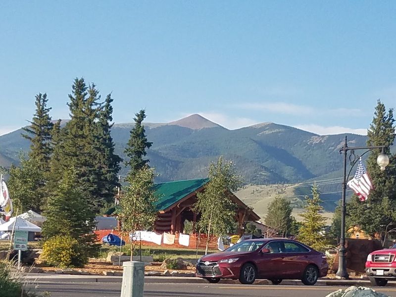 A Tiny Main Street Beneath Towering Peaks
