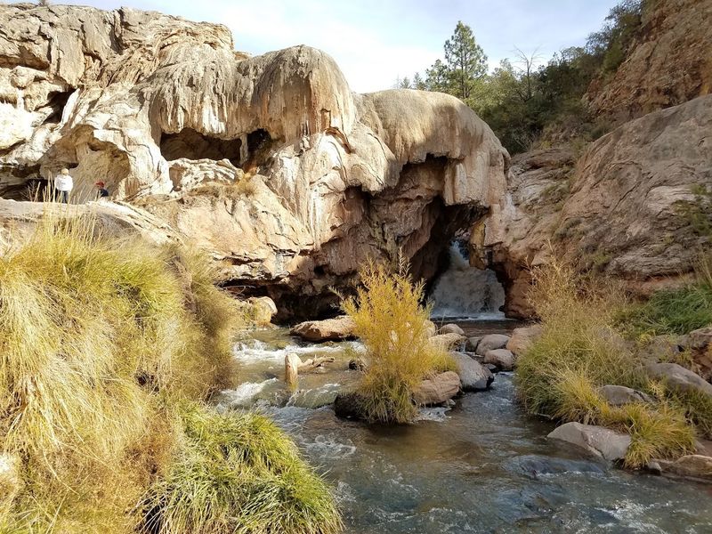 Water Still Rushes Beneath The Natural Dam