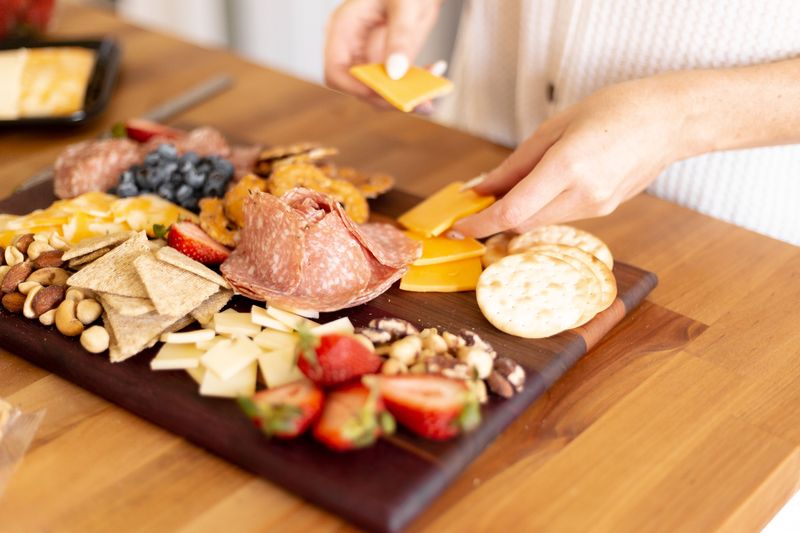 Summer Sausage Slices With Cheese And Crackers
