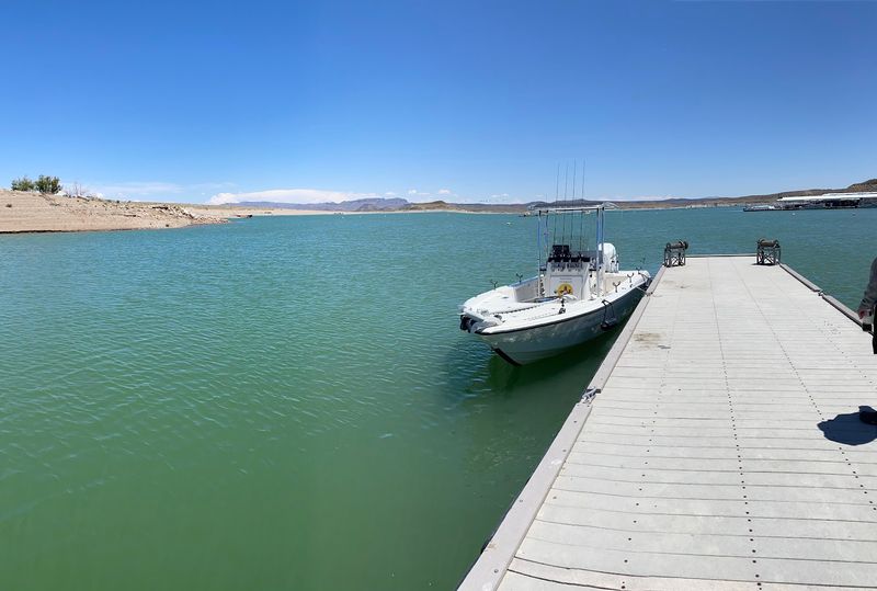 Boats Gathering Beneath Wide Desert Skies