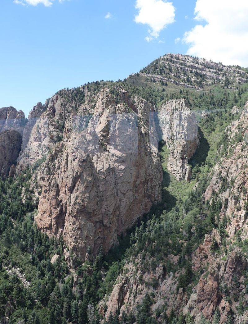 Granite Cliffs Rise Beside The Cables