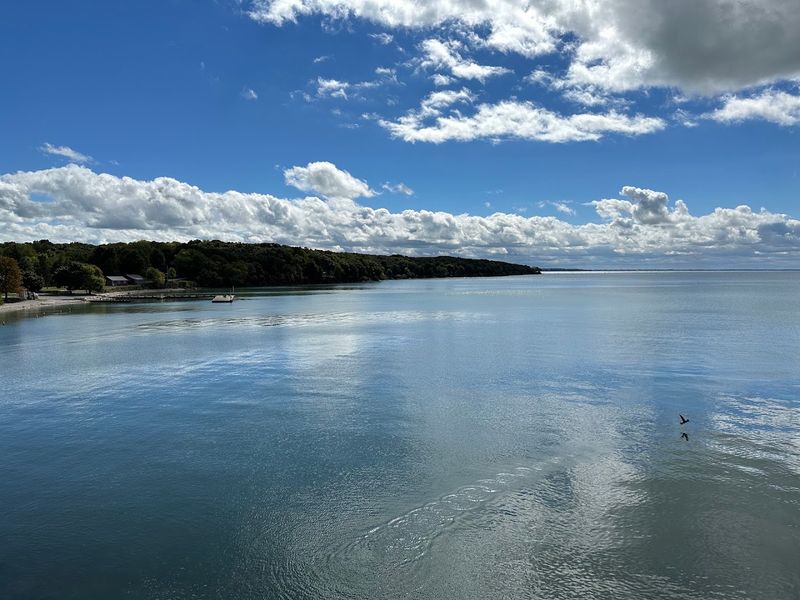 White Limestone Cliffs Give The Shoreline A Sharp Edge