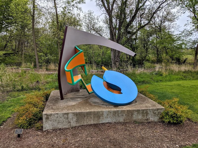 The Diver Turns Painted Aluminum Into A Midair Plunge