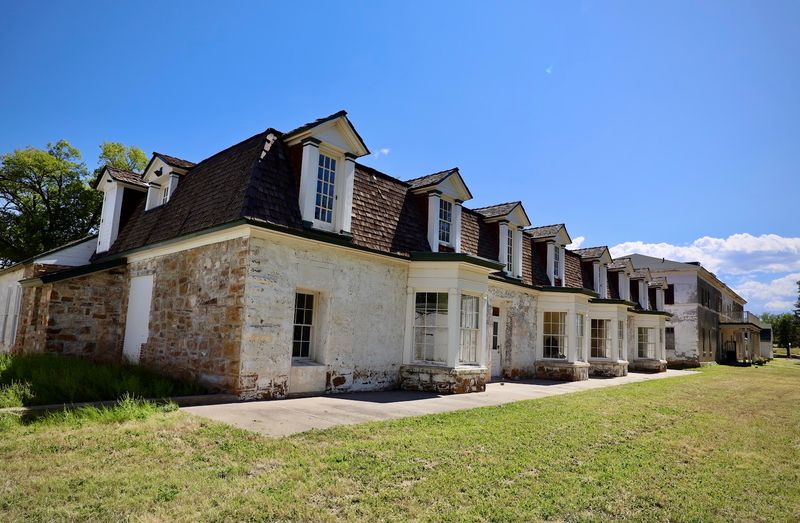 Whitewashed Buildings Frame The Parade Ground