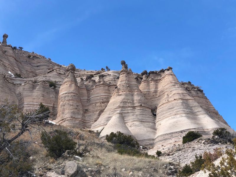 Pale Cliffs Under A Wide Desert Sky