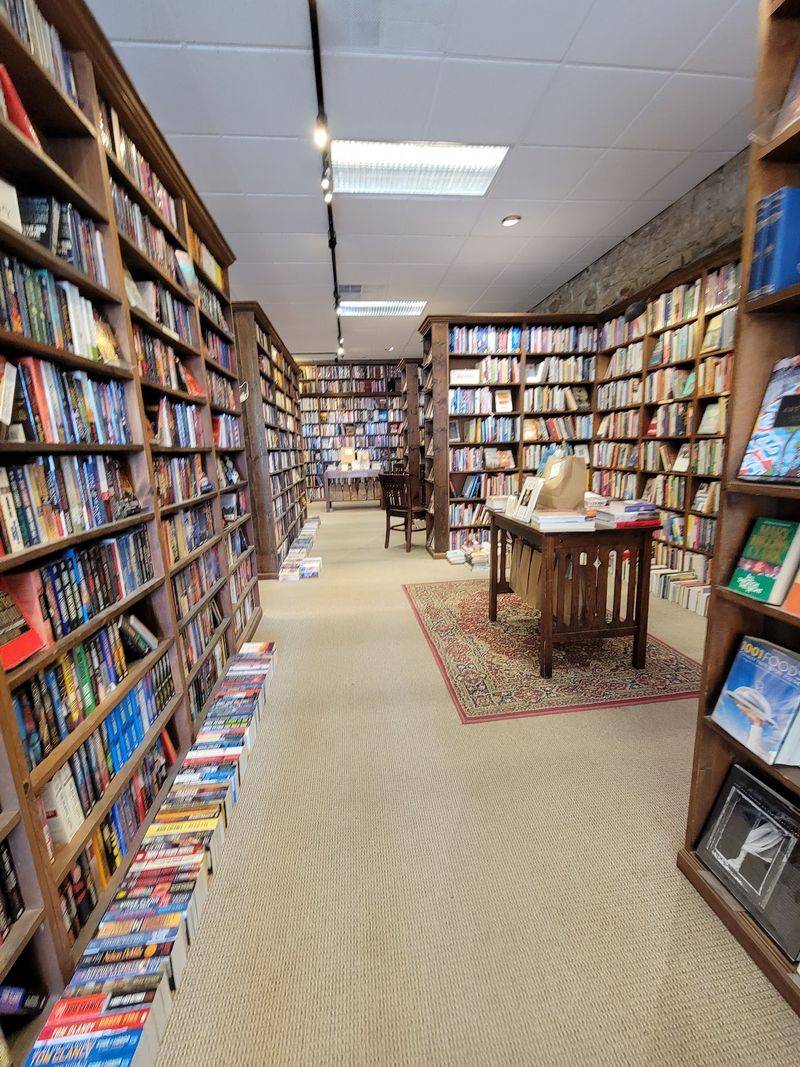 The Dusty Bookshelf, Lawrence