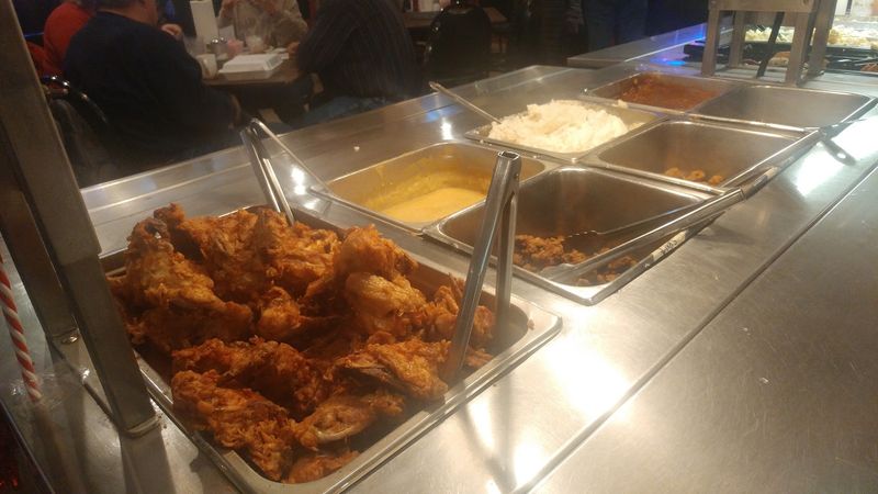Fried Chicken Stacked High On The Buffet Line