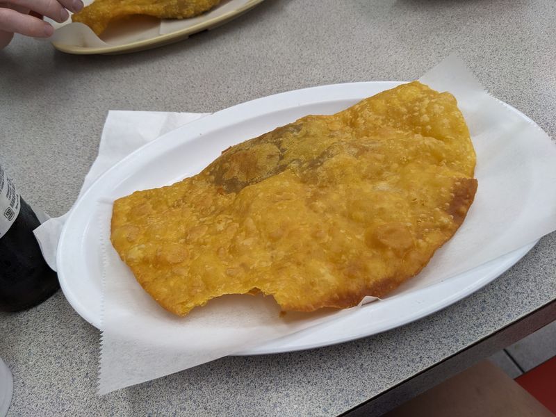 The Empanada With Beef in the Middle and a Ring of Golden Crust