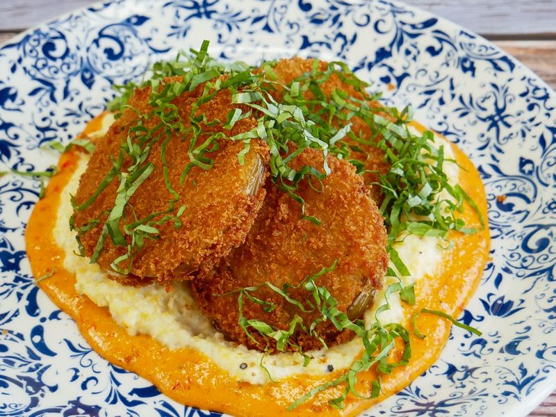 Famous Fried Green Tomatoes on a Bed of Grits