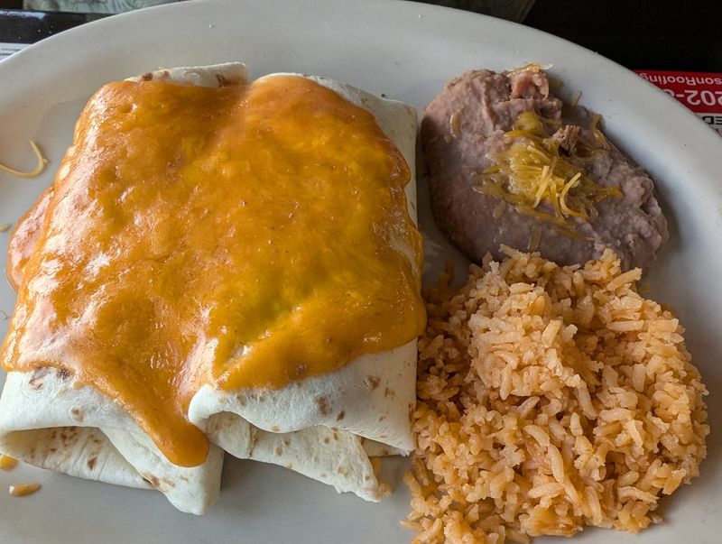 Pork Burritos Wearing A Sauce Worth Noticing
