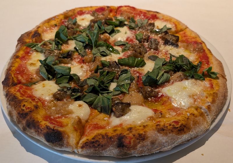 Wood-Fired Pizza Comes From An Italian Pizza Oven