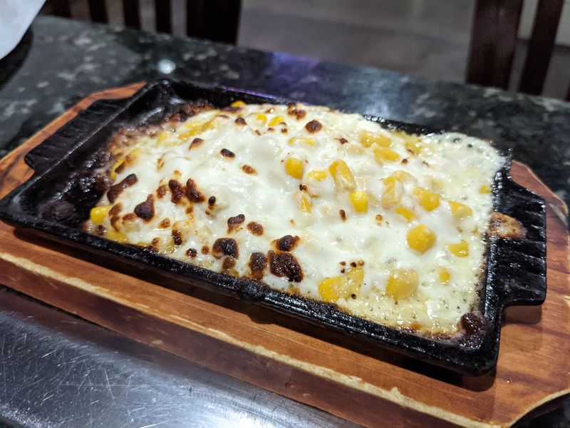 Cheesy Corn Sneaks Onto The Table And Steals Attention