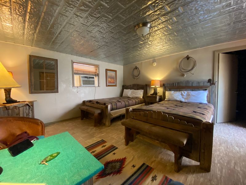 Rustic Cabins Keep The Night Closely Tied To The Ranch