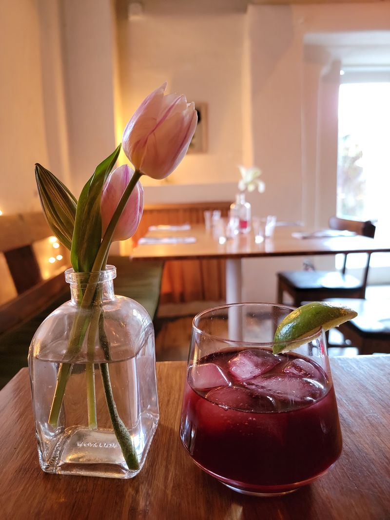 Fresh Flowers Add Color To The Intimate Interior