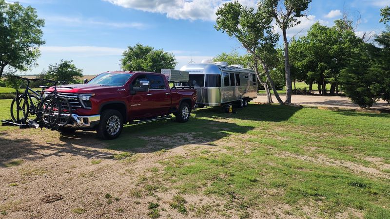 Camping And RV Sites Spread Across The Grassland Above