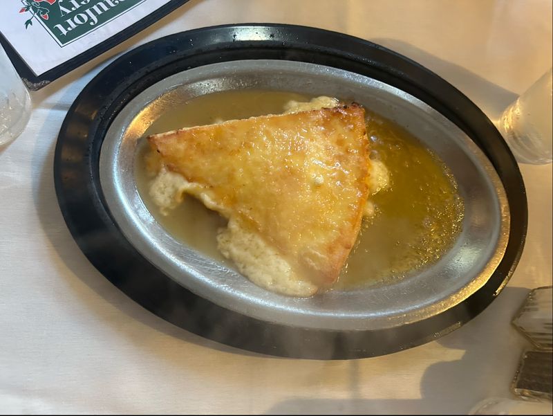 Saganaki Set Aflame at Your Table