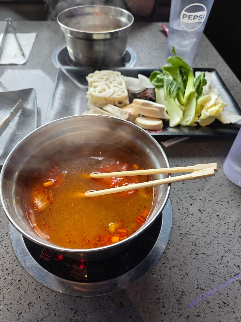 Hot Pot Broths Bubbling Beside You