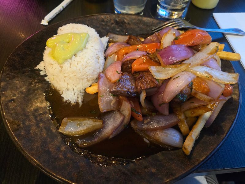 Lomo Saltado and the Sizzle of the Grill