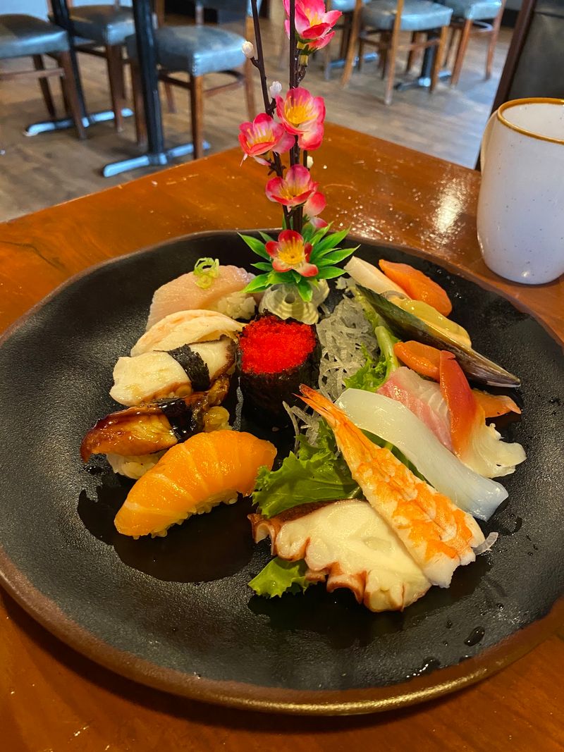 Sushi And Sashimi Give The Table Plenty To Compare