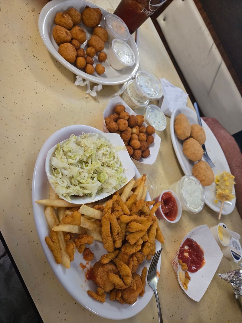 The menu lists classic fish-camp fare