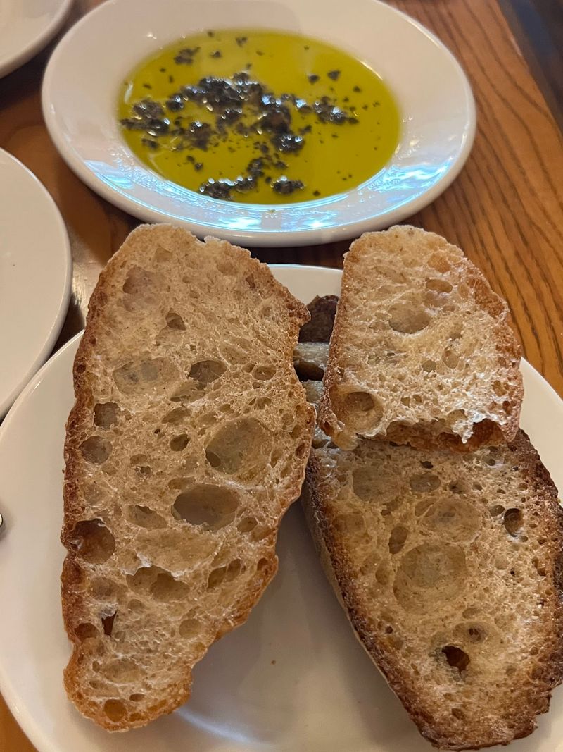 Warm Sourdough and Herbed Olive Oil to Start