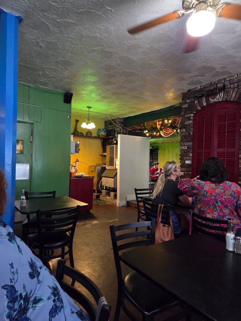 Green Walls And Blue Columns Inside