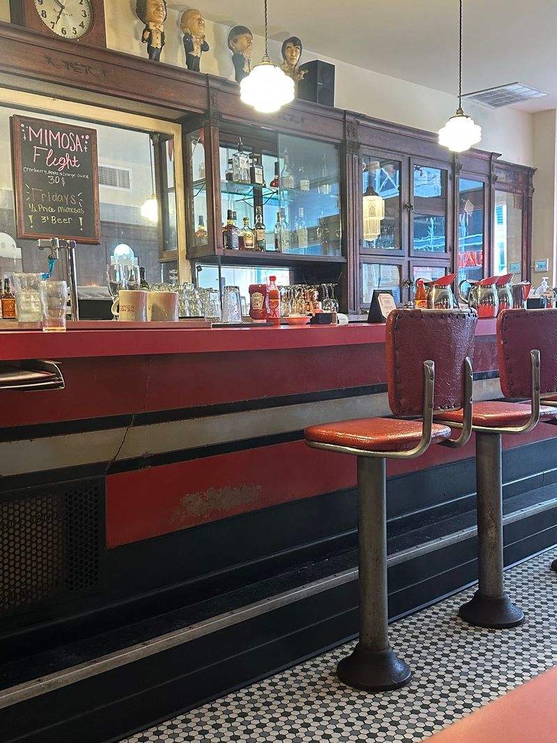 Vintage Booths And Counter Stools Keep The Room Familiar
