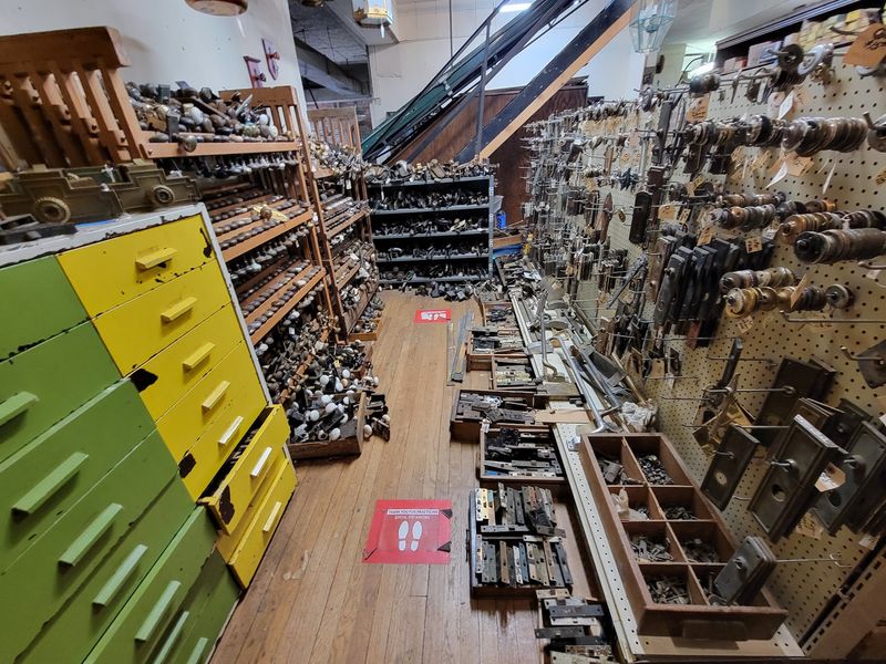 Bins Of Old Knobs, Hinges, And Latches