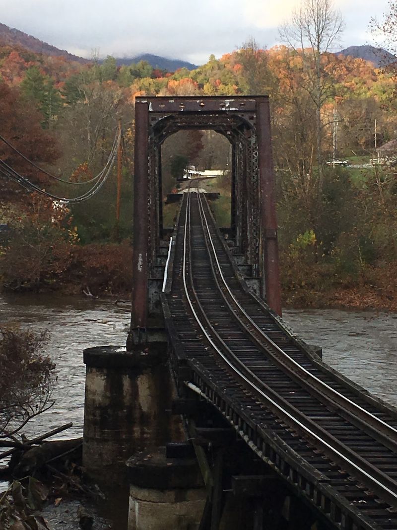 The Railroad Turns Fall Color Into A Moving View