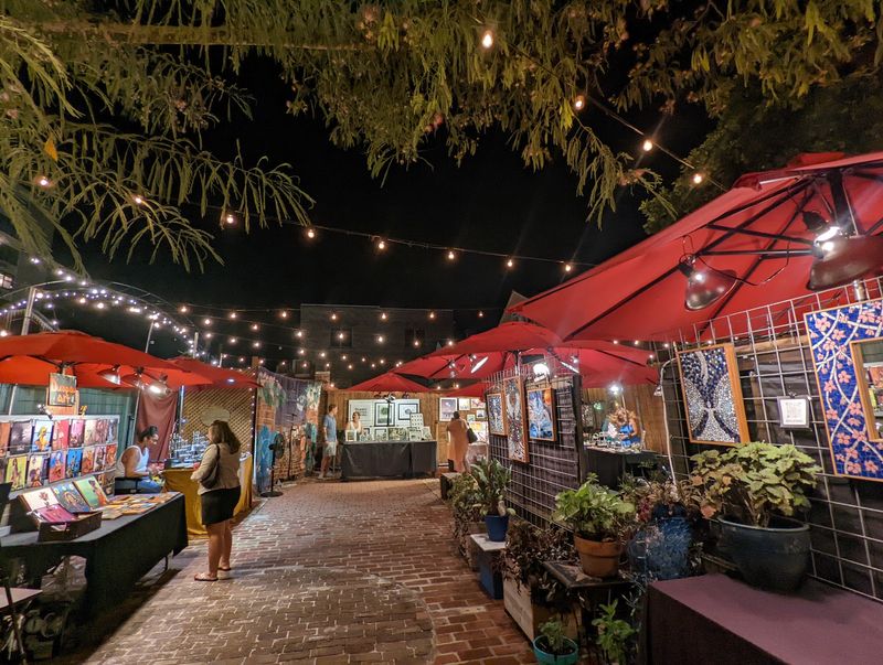 A lantern-lit alley with festival energy