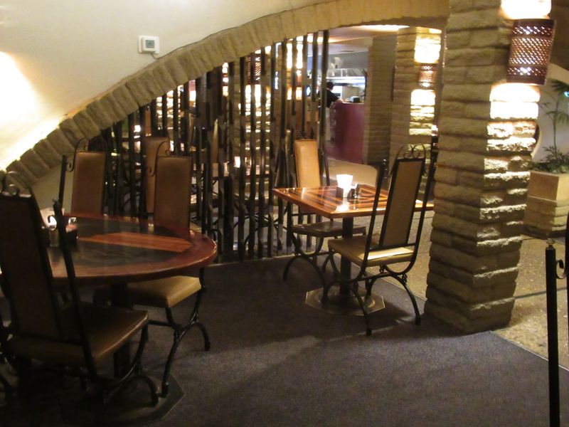 Arched Details Make The Dining Room Stand Out