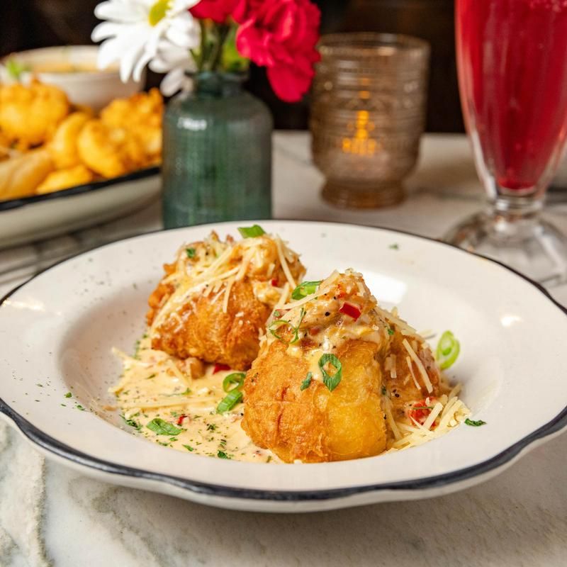French Beignets With A Crawfish Sauce Twist