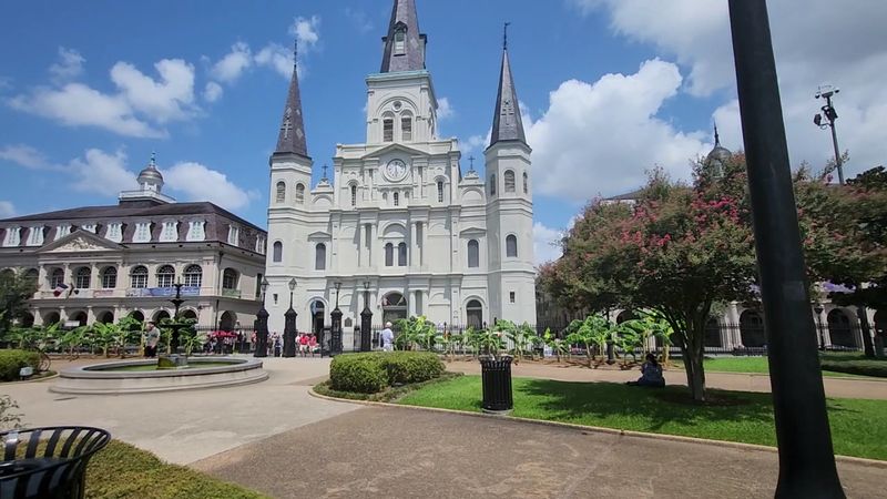 Three Spires And A Symmetrical White Façade