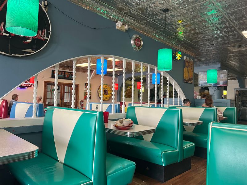 A Retro Cafe Full of Vinyl Booths and Nostalgia