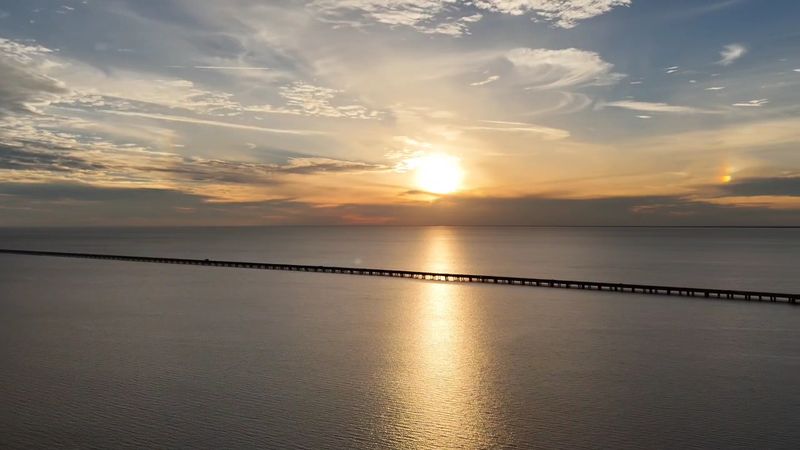 Sunrises, Sunsets, And Passing Pelicans