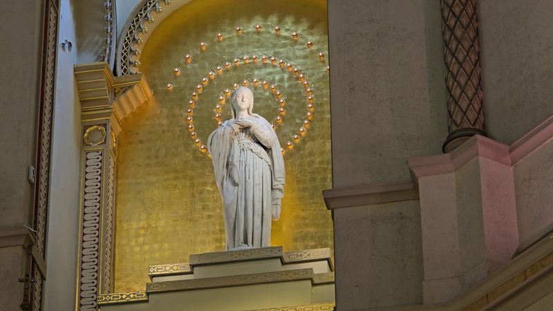 Mary's Niche And The Statue Behind The Altar