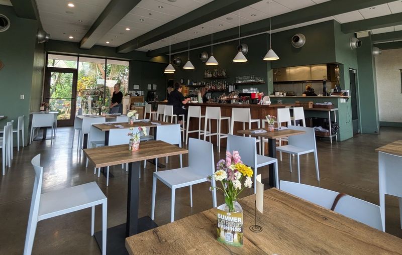 A Glass-Walled Dining Room Hiding In Plain Sight